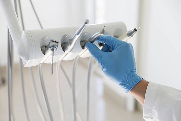 Professional Tooth Extraction technician working in Garden Ridge, TX
